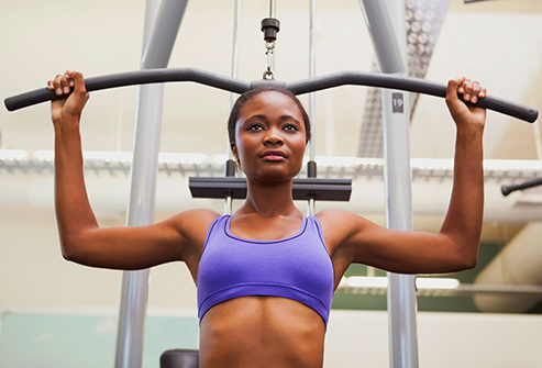 493_getty_rf_woman_weight_lifting